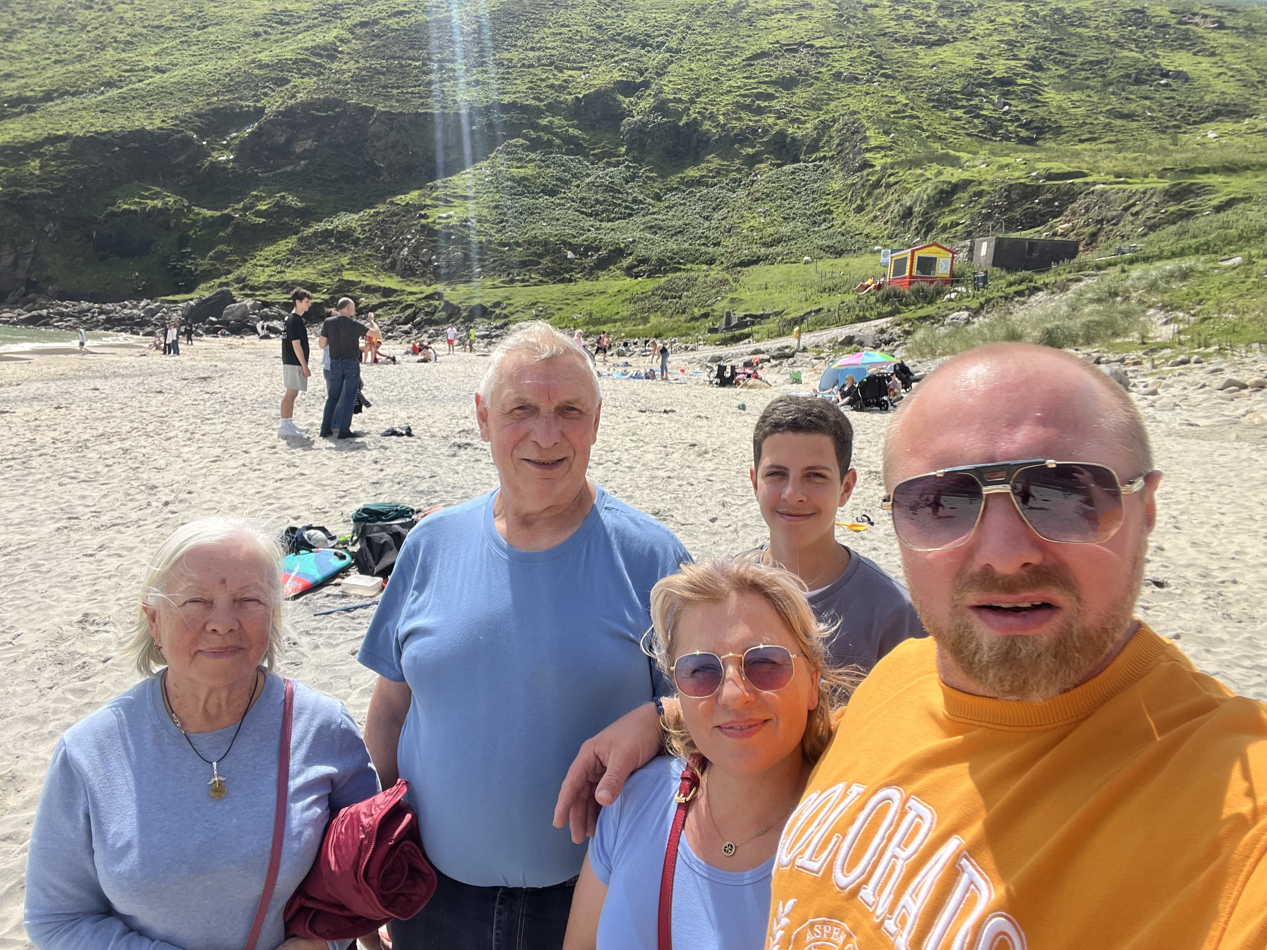 A family enjoying a day at the beach together